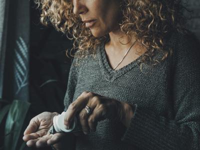 Woman taking pills
